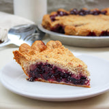 A slice of Blueberry Lavender Streusel pie from Four & Twenty Blackbirds. 